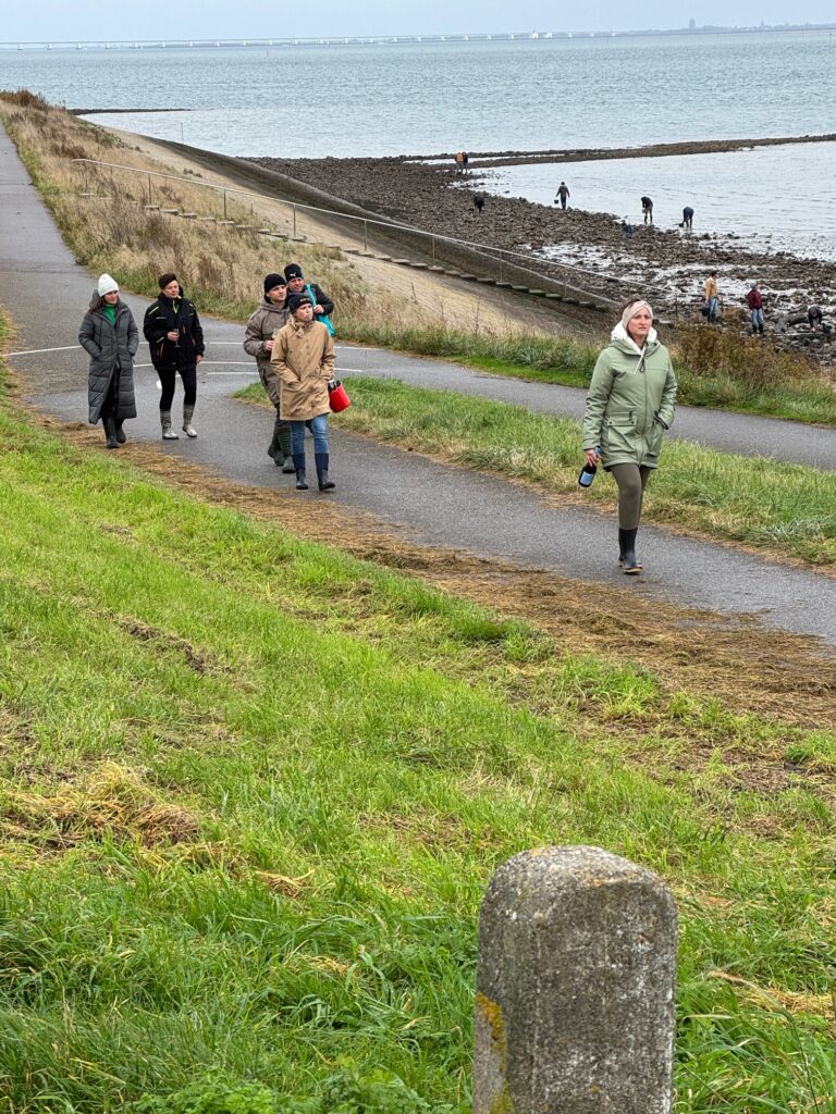 Jodi M Noord Group with Champ bottle